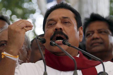Former Sri Lankan president Mahinda Rajapaksa speaks to his supporters at his residence in Medamulana, July 1, 2015. PHOTO BY REUTERS/Dinuka Liyanawatte
