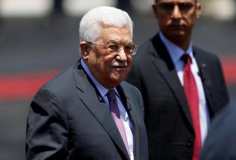 Palestinian President Mahmoud Abbas stands during a reception ceremony for Jordan's King Abdullah II in the West Bank city of Ramallah, August 7, 2017. PHOTO BY REUTERS/Mohamad Torokman