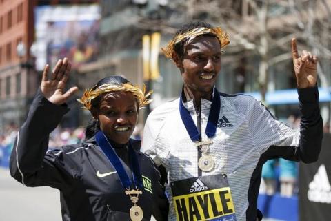 AAtsede Baysa and Lemi Berhanu Hayle pose for a photograph after winning the 120th Boston Marathon. PHOTO BY REUTERS/Greg M. Cooper-USA TODAY Sports