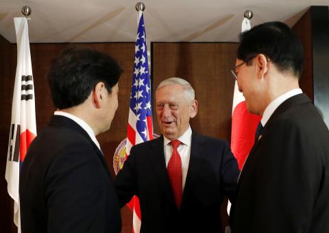 Japan's Defence Minister Itsunori Onodera, U.S. Secretary of Defence Jim Mattis and South Korea's Defence Minister Song Young-moo attend a trilateral meeting on the sidelines of the IISS Shangri-la Dialogue in Singapore, June 3, 2018. PHOTO BY REUTERS/Edgar Su