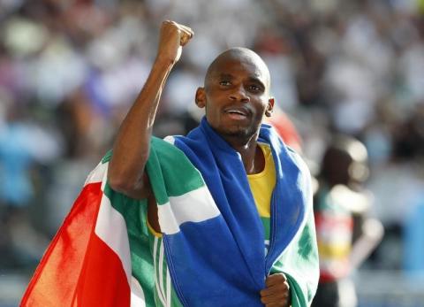 Mbulaeni Mulaudzi of South Africa celebrates after winning the men's 800 metres final during the world athletics championships in Berlin, August 23, 2009. PHOTO BY REUTERS/Phil Noble