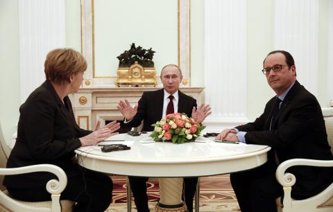 German Chancellor Angela Merkel, Russia's President Vladimir Putin and French President Francois Hollande attend a meeting on resolving the Ukraine crisis at the Kremlin in Moscow, February 6, 2015. PHOTO BY REUTERS/Maxim Zmeyev