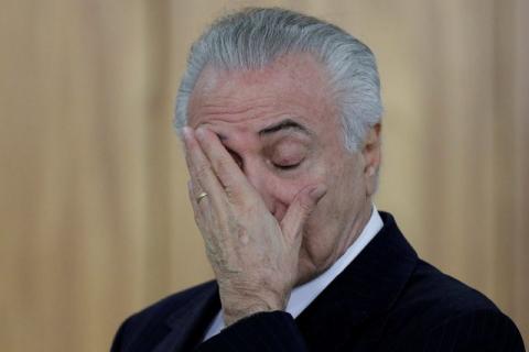 Brazilian President Michel Temer reacts during a credentials presentation ceremony for several new top diplomats at Planalto Palace in Brasilia, Brazil, June 26, 2017. PHOTO BY REUTERS/Ueslei Marcelino