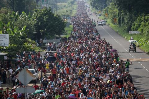 A caravan of thousands of migrants from Central America walk towards Tapachula from Ciudad Hidalgo while en route to the United States, in Frontera Hidalgo, Mexico, October 21, 2018. PHOTO BY REUTERS/Adrees Latif