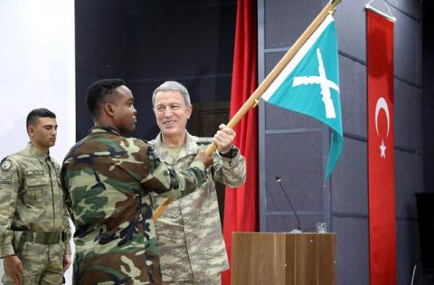 Turkish military chief of staff General Hulusi Akar and a Somali soldier participate during the opening ceremony of a Turkish military base in Mogadishu, Somalia, September 30, 2017. PHOTO BY REUTERS/Feisal Omar