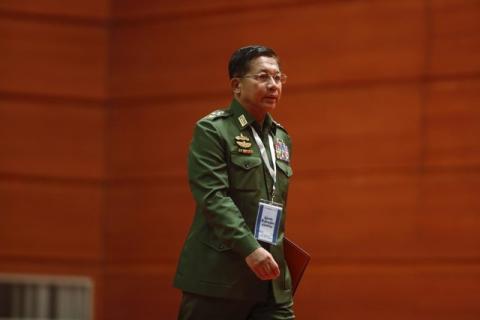 Myanmar's commander-in-chief Senior General Min Aung Hlaing arrives to give a speech during talks between the government, army and representatives of ethnic armed groups over a ceasefire to end insurgencies, in Naypyidaw, January 12, 2016. PHOTO BY REUTERS/Soe Zeya Tun