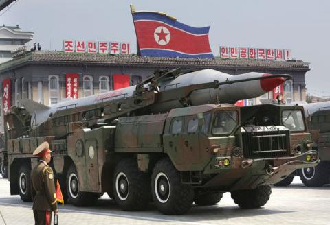 A missile is carried by a military vehicle during a parade to commemorate the 60th anniversary of the signing of a truce in the 1950-1953 Korean War, at Kim Il-sung Square in Pyongyang, July 27, 2013. PHOTO BY  REUTERS/Jason Lee