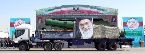 A military truck carrying a missile and a picture of Iran's Supreme Leader Ayatollah Ali Khamenei is seen during a parade marking the anniversary of the Iran-Iraq war (1980-88) in Tehran, in this September 22, 2015 file photo. PHOTO BY REUTERS/Raheb Homavandi