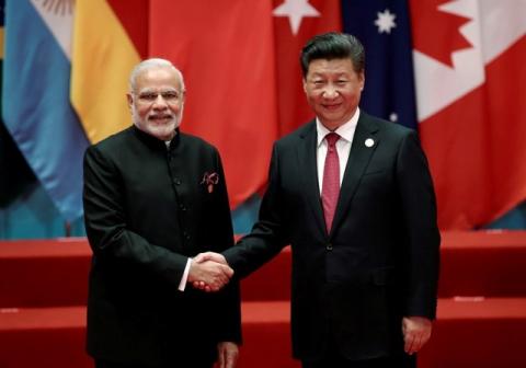 Chinese President Xi Jinping shakes hands with Indian Prime Minister Narendra Modi during the G20 Summit in Hangzhou, Zhejiang province, China, September 4, 2016. PHOTO BY REUTERS/Damir Sagolj