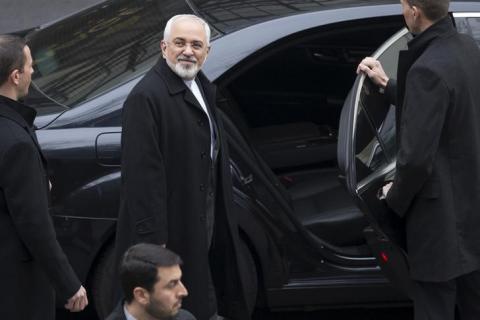 Iran's Foreign Minister Javad Zarif (C) departs his hotel to return to Iran following days of negotiations with United States Secretary of State John Kerry over Iran's nuclear program in Lausanne, Switzerland March 20, 2015. PHOTO BY REUTERS/Brian Snyder