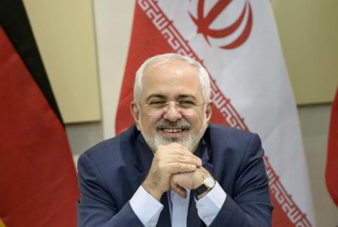 Iranian Foreign Minister Javad Zarif smiles as he waits for the start of a meeting with P5+1, European Union and Iranian officials at the Beau Rivage Palace Hotel in Lausanne March 30, 2015, during Iran nuclear talks. PHOTO BY REUTERS/Brendan Smialowski