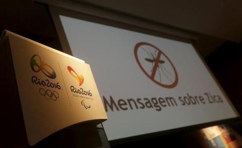 The logos of the Rio 2016 Olympic Games and Rio 2016 Paralympic Games are pictured next to a message on a screen that reads "Message about Zika" during a media briefing in Rio de Janeiro, Brazil, February 2, 2016. PHOTO BY REUTERS/Ricardo Moraes