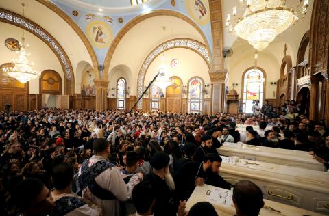 Mourners gather for the funeral of Coptic Christians who were killed in an attack, at the Prince Tadros Church in Minya, Egypt, November 3, 2018. PHOTO BY REUTERS/Mohamed Abd El Ghany