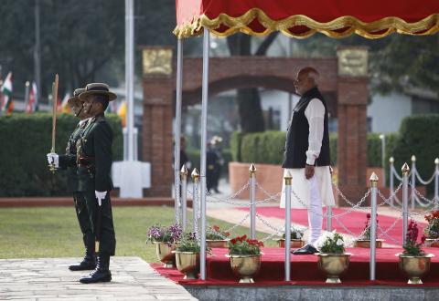 Prime Minister Narendra Modi watches a guard of honour upon his arrival for the 18th South Asian Association for Regional Cooperation (SAARC) summit in Kathmandu, November 25, 2014. PHOTO BY REUTERS/Navesh Chitrakar