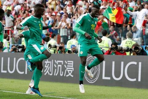 Senegal's M'Baye Niang celebrates scoring their second goal with Idriss Gueye. PHOTO BY REUTERS/Grigory Dukor