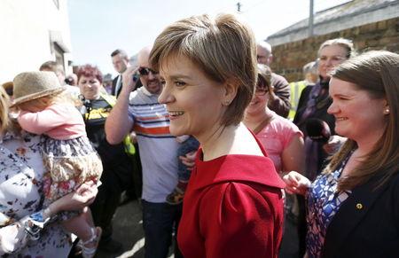 Scottish National Party (SNP) leader Nicola Sturgeon greets supporters during a campaign visit to in Ayr, Scotland, in this April 21, 2015 file photo. PHOTO BY REUTERS/Russell Cheyne