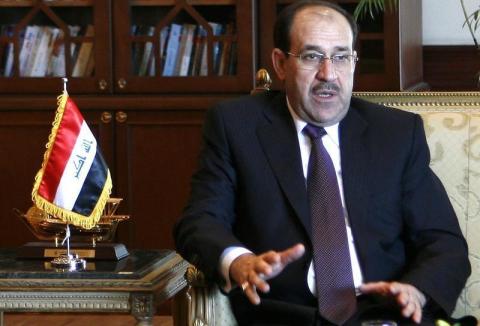 Iraq's Prime Minister Nouri Maliki gestures during talks with his Egyptian counterpart Ahmed Nazif in Cairo