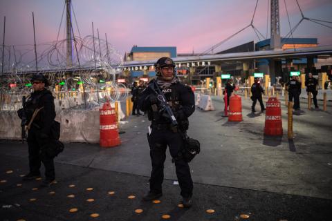 U.S. Customs and Border Protection (CBP) Special Response Team (SRT) officers stand guard at the San Ysidro Port of Entry after the land border crossing was temporarily closed to traffic from Tijuana, Mexico, November 19, 2018. PHOTO BY REUTERS/Adrees Latif