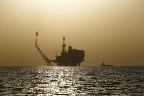 An offshore oil platform is seen at the Bouri Oil Field off the coast of Libya, August 3, 2015. PHOTO BY REUTERS/Darrin Zammit Lupi