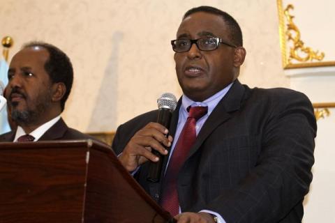 Newly elected Somalia Prime Minister Omar Abdirashid Ali Sharmarke (R), flanked by Somalia's President Hassan Sheikh Mohamud, addresses delegates in the capital Mogadishu, December 17, 2014. PHOTO BY REUTERS/Omar Faruk