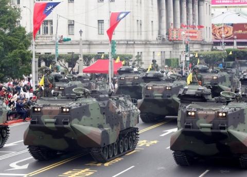 AAV-P7A1 amphibious assault vehicles of the Taiwan Marine Corps are part of a parade during Taiwan's National Day celebrations in front of the Presidential Office in Taipei, October 10, 2011. PHOTO BY REUTERS/Pichi Chuang
