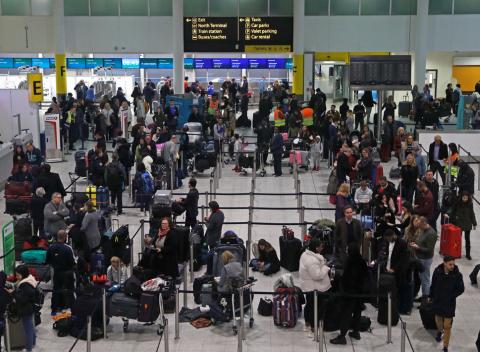 Passengers wait around in the South Terminal building at Gatwick Airport after drones flying illegally over the airfield forced the closure of the airport, in Gatwick, Britain, December 20, 2018. PHOTO BY REUTERS/Peter Nicholls