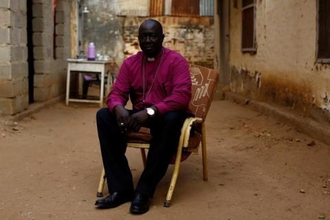 Anglican Bishop Paul Yogusuk poses in the courtyard of his home in the capital Juba, South Sudan, February 19, 2017. PHOTO BY REUTERS/Siegfried Modola