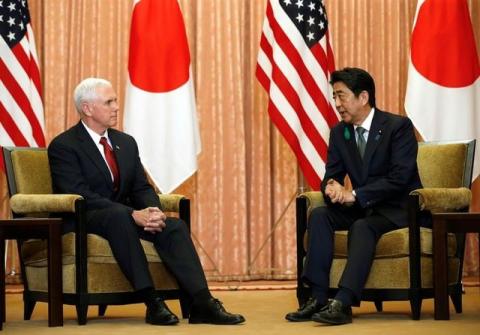 U.S. Vice President Mike Pence (L) talks with Japan's Prime Minister Shinzo Abe during their meeting at Abe's official residence in Tokyo, Japan, April 18, 2017. PHOTO BY REUTERS/Kim Kyung-Hoon