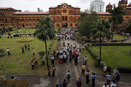 People visit the Ministers' Building, formerly known as the Secretariat Builidng, where General Aung San and eight others were assassinated, during an event marking the anniversary of Martyrs' Day in Yangon July 19, 2015. PHOTO BY REUTERS/Soe Zeya Tun