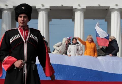People attend a rally marking the second anniversary of Russia's annexation of Ukraine's Crimea region in the Black Sea port of Sevastopol, Crimea, March 18, 2016. PHOTO BY REUTERS/Pavel Rebrov