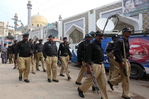 Policemen gather outside the tomb of Sufi saint Syed Usman Marwandi, also known as the Lal Shahbaz Qalandar shrine, after Thursday's suicide blast in Sehwan Sharif, Pakistan's southern Sindh province, February 17, 2017. PHOTO BY REUTERS/Akhtar Soomro