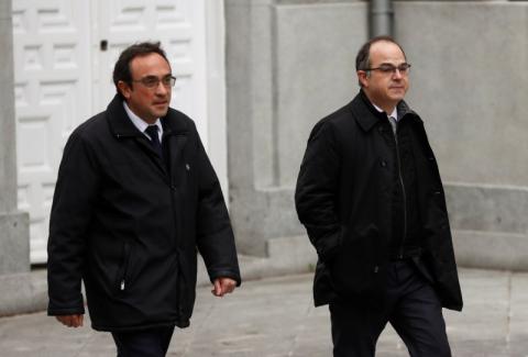 Catalan politicians Josep Rull (L) and Jordi Turull arrive together to the Supreme Court after being summoned and facing investigation for their part in Catalonia's bid for independence in Madrid, Spain, March 23, 2018. PHOTO BY REUTERS/Juan Medina