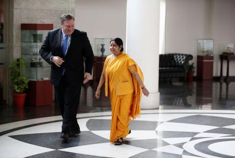 U.S. Secretary of State Mike Pompeo walks with India’s Foreign Minister Sushma Swaraj before the start of their meeting in New Delhi, India, September 6, 2018. PHOTO BY REUTERS/Adnan Abidi