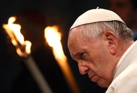 Pope Francis leads the Via Crucis (Way of the Cross) procession during Good Friday celebrations in front of the Colosseum in Rome, Italy, April 14, 2017. PHOTO BY REUTERS/Alessandro Bianchi