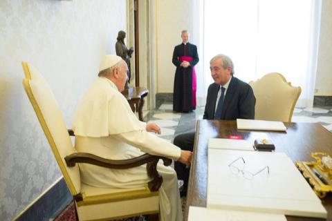 Pope Francis meets Libero Milone (R), the Vatican's auditor general, at the Vatican, April 1, 2016. PHOTO BY REUTERS/Osservatore Romano