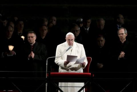 Pope Francis delivers his speech as he leads the "Via Crucis" (Way of the Cross) procession, which commemorates the crucifixion of Jesus Christ at the Colosseum in Rome, March 25, 2016. PHOTO BY REUTERS/Max Rossi