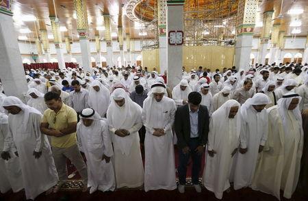 Sunni and Shi'ites conduct joint Friday prayers to show solidarity and co-existence between the two sects of Islam at Al A'ali Grand Mosque in Al A'ali south of Manama, July 3, 2015. PHOTO BY REUTERS/Hamad I Mohammed