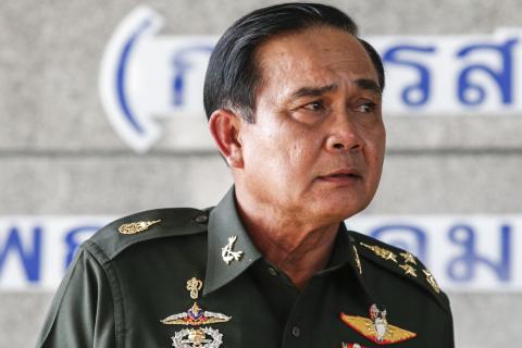 Thai army chief General Prayuth Chan-ocha listens to questions from the media during a news conference at the Army Club after the army declared martial law nationwide to restore order, in Bangkok