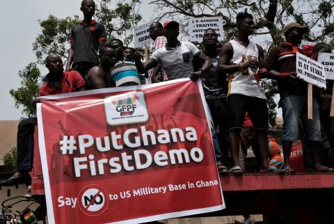 Demonstrators carry banners during a protest in Ghana's capital Accra against the expansion of its defence cooperation with the United States, Ghana, March 28, 2018. PHOTO BY REUTERS/Francis Kokoroko