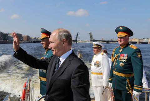 Russian President Vladimir Putin, Defence Minister Sergei Shoigu and Commander of Western military district Colonel-General Andrei Kartapolov attend the Navy Day parade in St. Petersburg, Russia, July 29, 2018. PHOTO BY REUTERS/Sputnik/Mikhail Klementyev/Kremlin