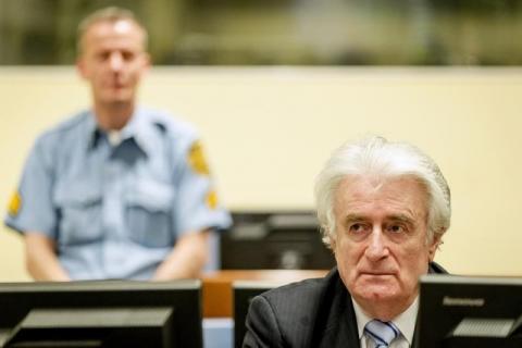 Ex-Bosnian Serb leader Radovan Karadzic sits in the court of the International Criminal Tribunal for former Yugoslavia (ICTY) in the Hague, the Netherlands, March 24, 2016. PHOTO BY REUTERS/Robin van Lonkhuijsen