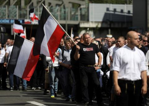 Far-right activists demonstrate to commemorate the suicide of Germany's former Deputy Fuehrer Rudolph Hess 30 years ago, in Berlin, Germany, August 19, 2017. PHOTO BY REUTERS/Christian Mang