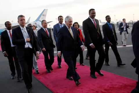 Ethiopia's Minister of Foreign Affairs Workneh Gebeyehu (center R) walks the red carpet with U.S. Secretary of State Rex Tillerson (center L) as he arrives to begin a six-day trip in Africa, landing at Addis Ababa International Airport in Addis Ababa, Ethiopia, March 7, 2018. PHOTO BY REUTERS/Jonathan Ernst