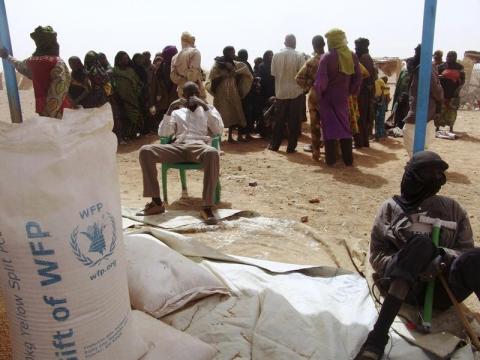 Malian refugees queue for food at the refugee camp of Taberey Baraye, some 7km (4 miles) from Ayorou, near the Mali-Niger border, January 31, 2013. PHOTO BY REUTERS/Alain Amontchi