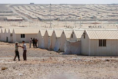 Syrian refugee children play at Azraq refugee camp for Syrians displaced by conflict, near Al Azraq city, Jordan, September 9, 2016. PHOTO BY REUTERS/Muhammad Hamed