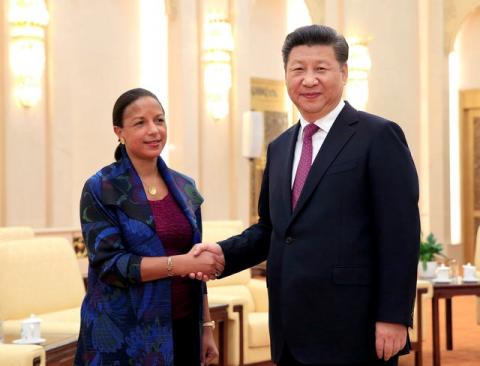 US National Security Adviser Susan Rice (L) shakes hands with Chinese President Xi Jinping during their meeting at the Great Hall of the People in Beijing, China, 25 July 2016. PHOTO BY REUTERS/How Hwee Young