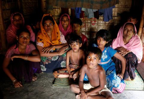 A group of Rohingya refugees takes shelter at the Kutuupalang makeshift refugee camp, after crossing the Myanmar-Bangladesh border today in Cox’s Bazar, Bangladesh, August 26, 2017. PHOTO BY REUTERS/Mohammad Ponir Hossain