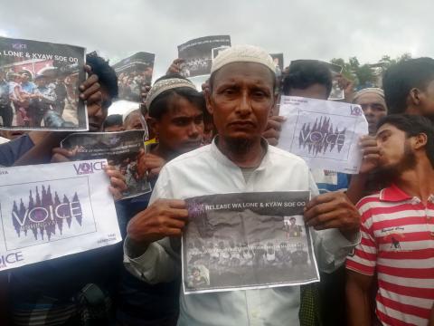 Rohingya Regugee Abdu Shakur, father of one of the victims of Inn Din massacre protests the sentencing of Reuters journalists Wa Lone and Kyaw Soe Oo at Teng Khali camp outside Cox's Bazar in Bangladesh, September 5, 2018. PHOTO BY REUTERS/Poppy McPherson