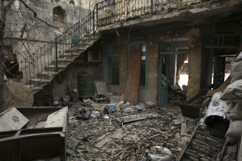 Rubble lies in a damaged building near Aleppo's historic citadel, which is controlled by forces loyal to Syria's President Bashar al-Assad