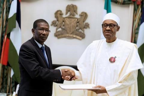 Nigeria's President Muhammadu Buhari greets Senegal's Ambassador to Nigeria Baboucar Sambe at the Presidential Villa in Abuja, Nigeria, January 11, 2017. PHOTO BY REUTERS/ Stringer